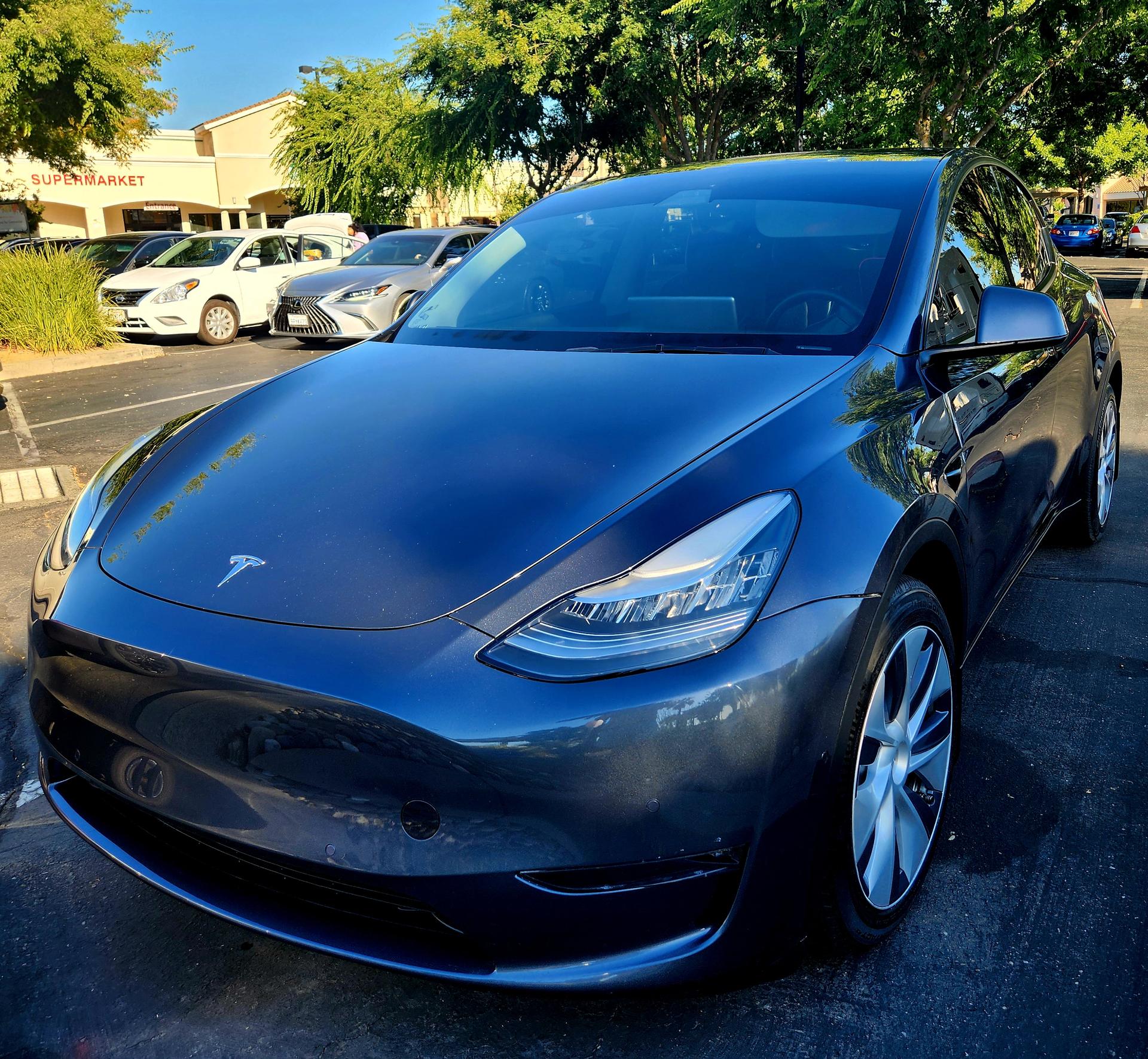 Tesla Model Y long range AWD salvage title 5